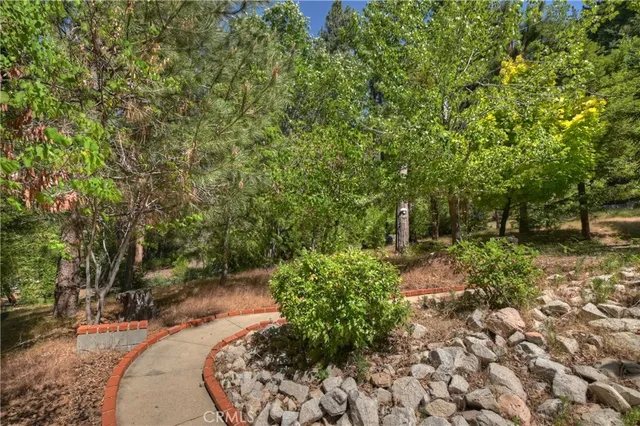 a backyard of a house with lots of green space