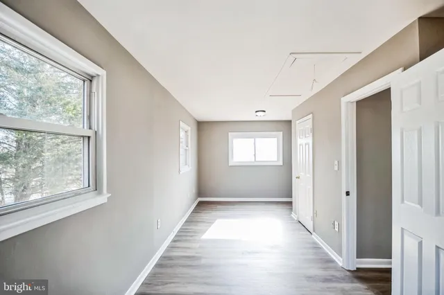 a view of an empty room and window