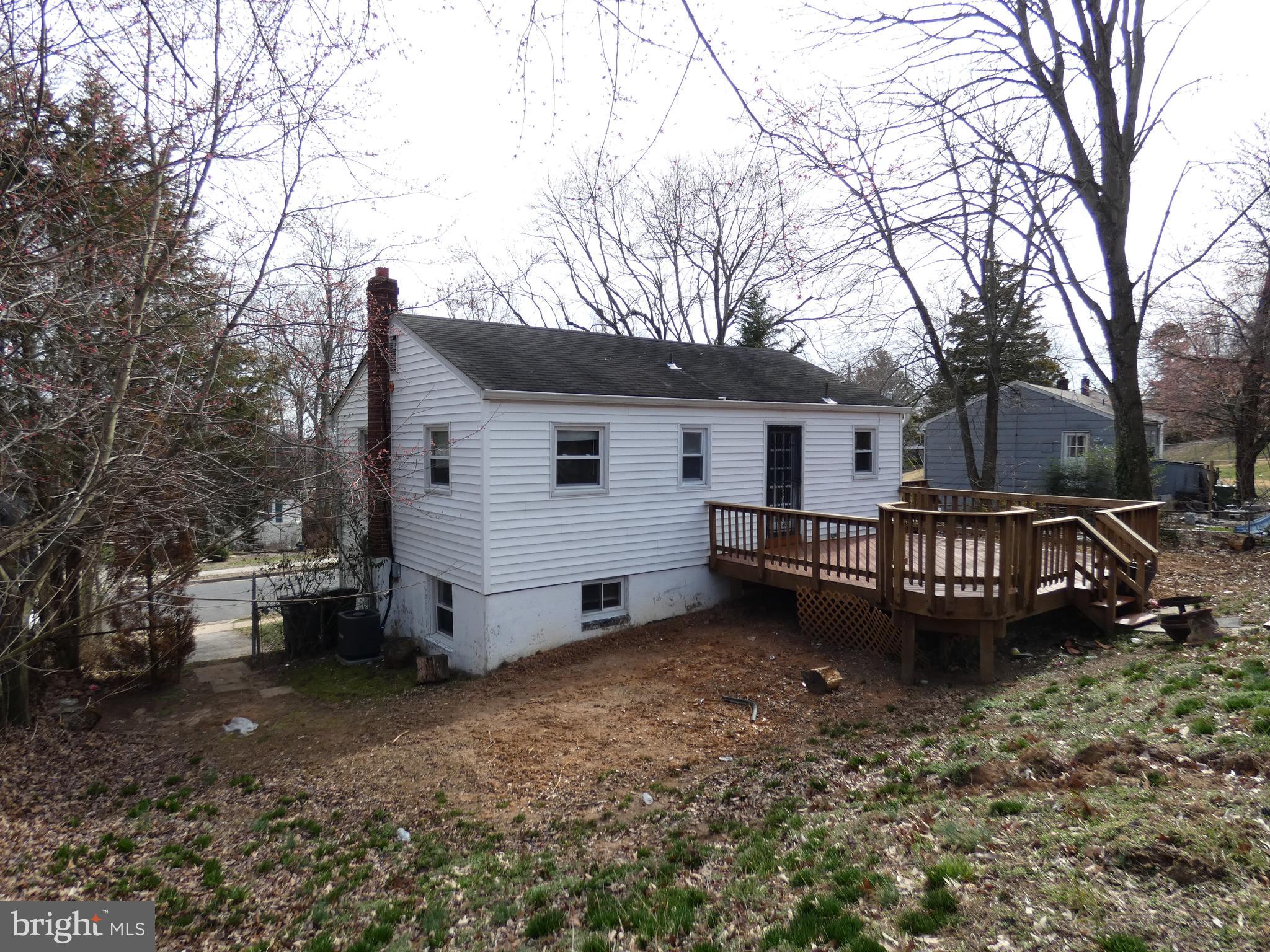 13426 Greenacre Drive Woodbridge, VA 22191 - Photo 27 of 45 a view of a house with a yard