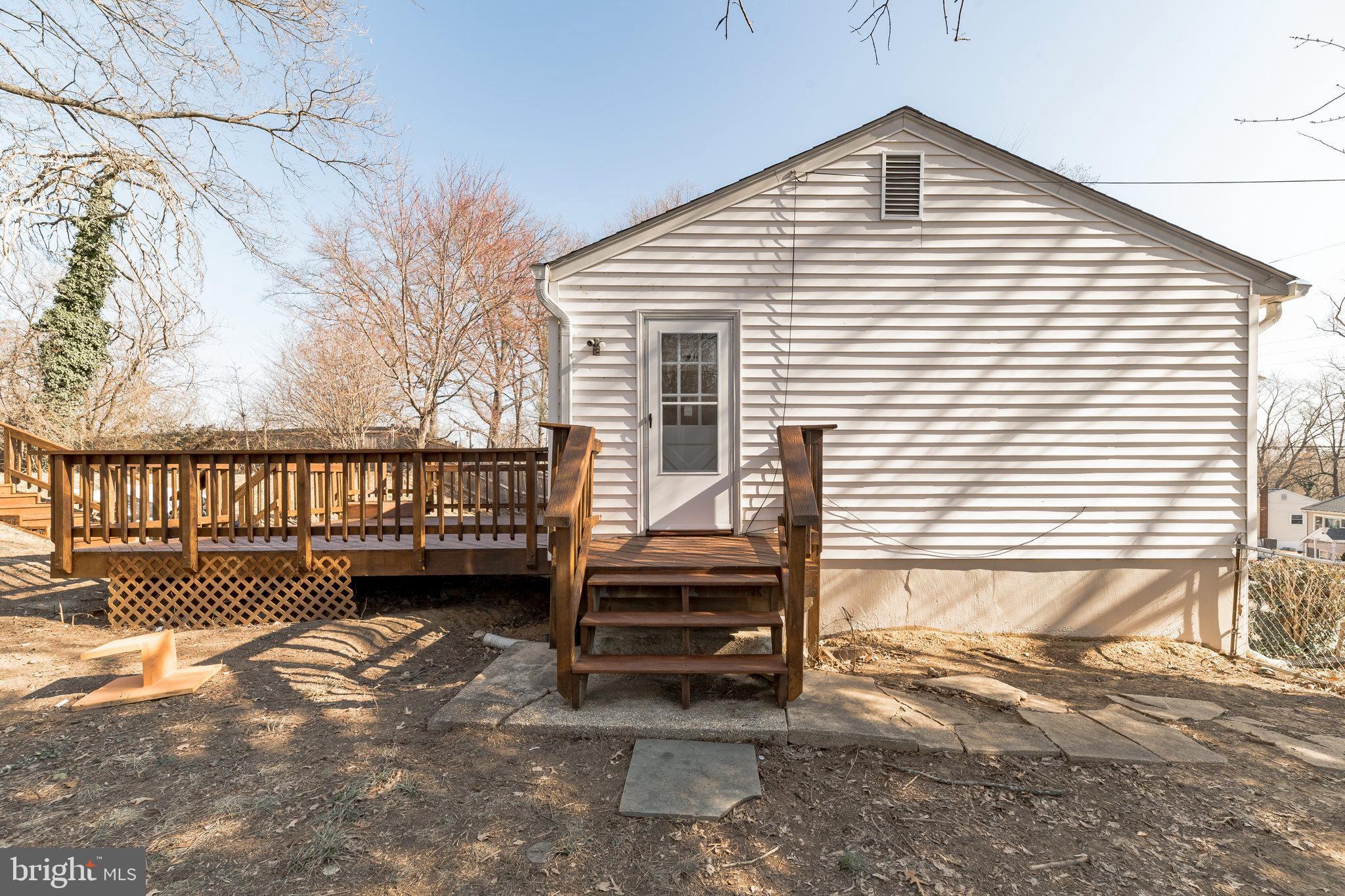 13426 Greenacre Drive Woodbridge, VA 22191 - Photo 39 of 45 a view of a house with a yard