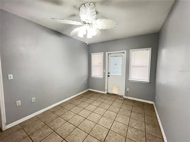 a view of an empty room and window