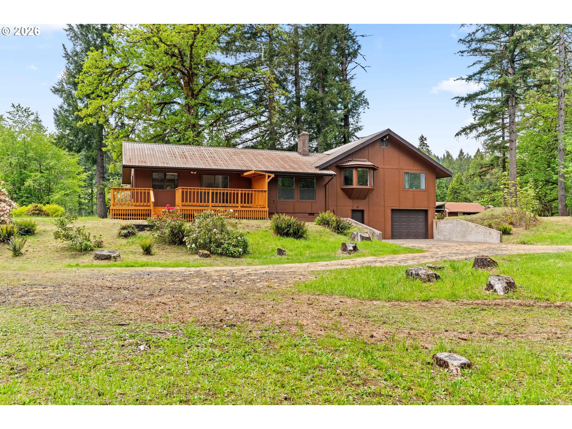 93933 Marcola Road Marcola, OR 97454 - Photo 1 of 35 a house view with a garden space