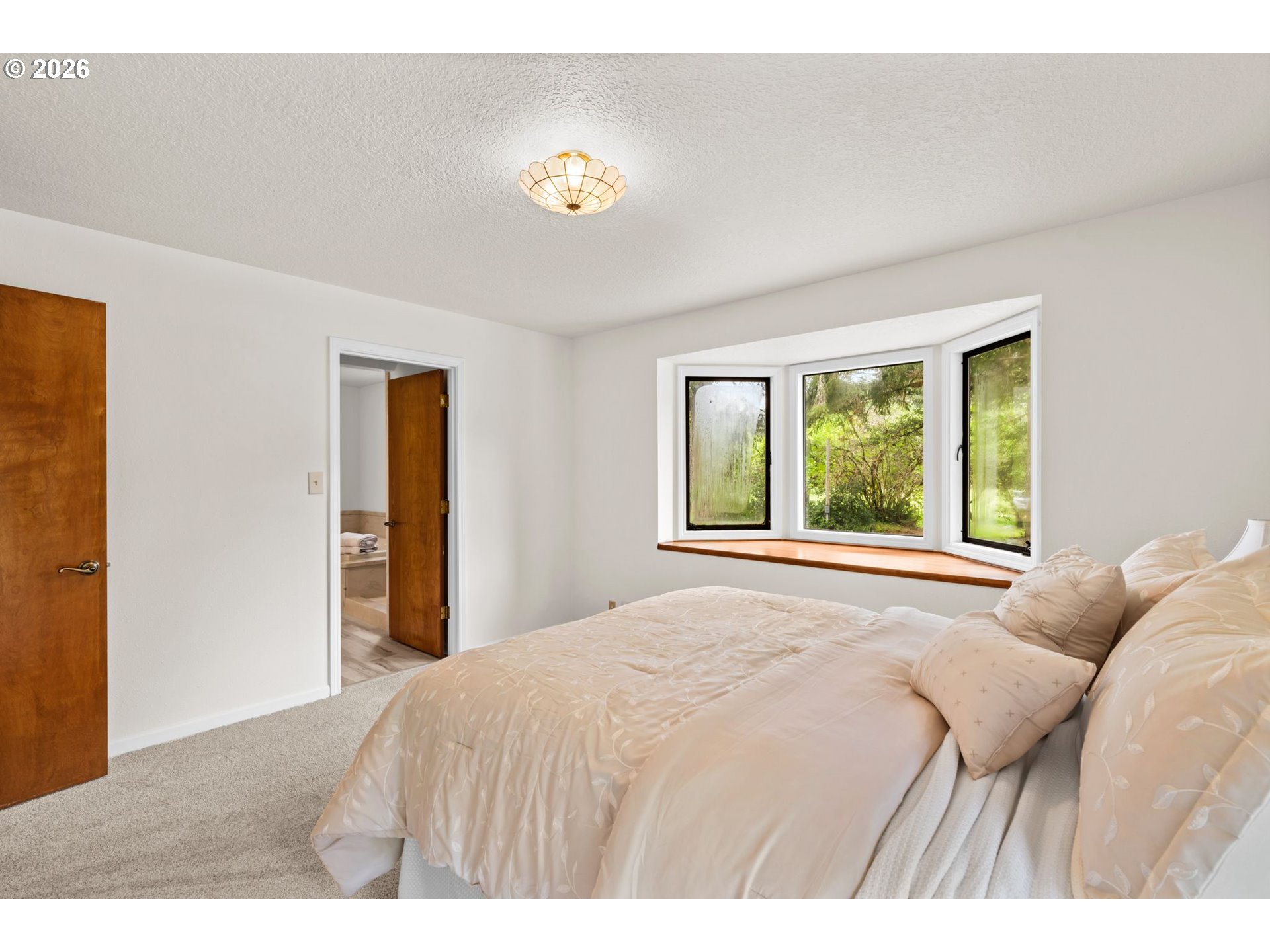 93933 Marcola Road Marcola, OR 97454 - Photo 12 of 35 a bedroom with a bed and a window