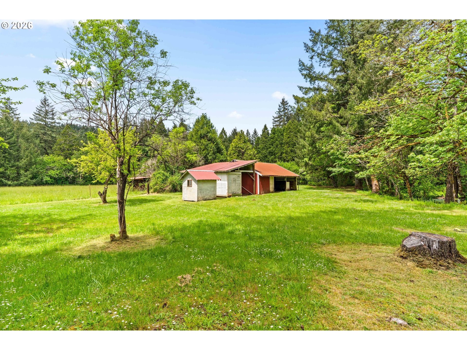 93933 Marcola Road Marcola, OR 97454 - Photo 19 of 35 a house is sitting in middle od the grass