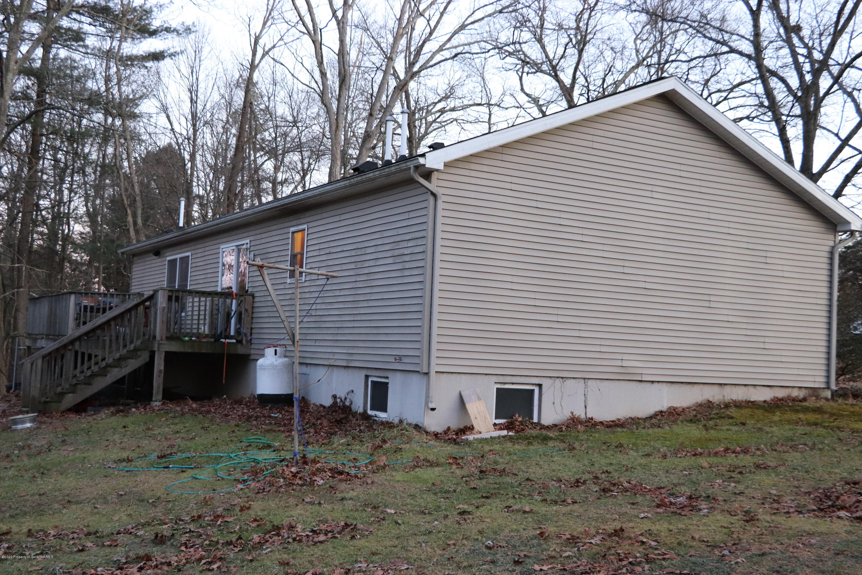 30 Brookside Road Tunkhannock, PA 18657 - Photo 40 of 47 a view of a house with a yard and garage