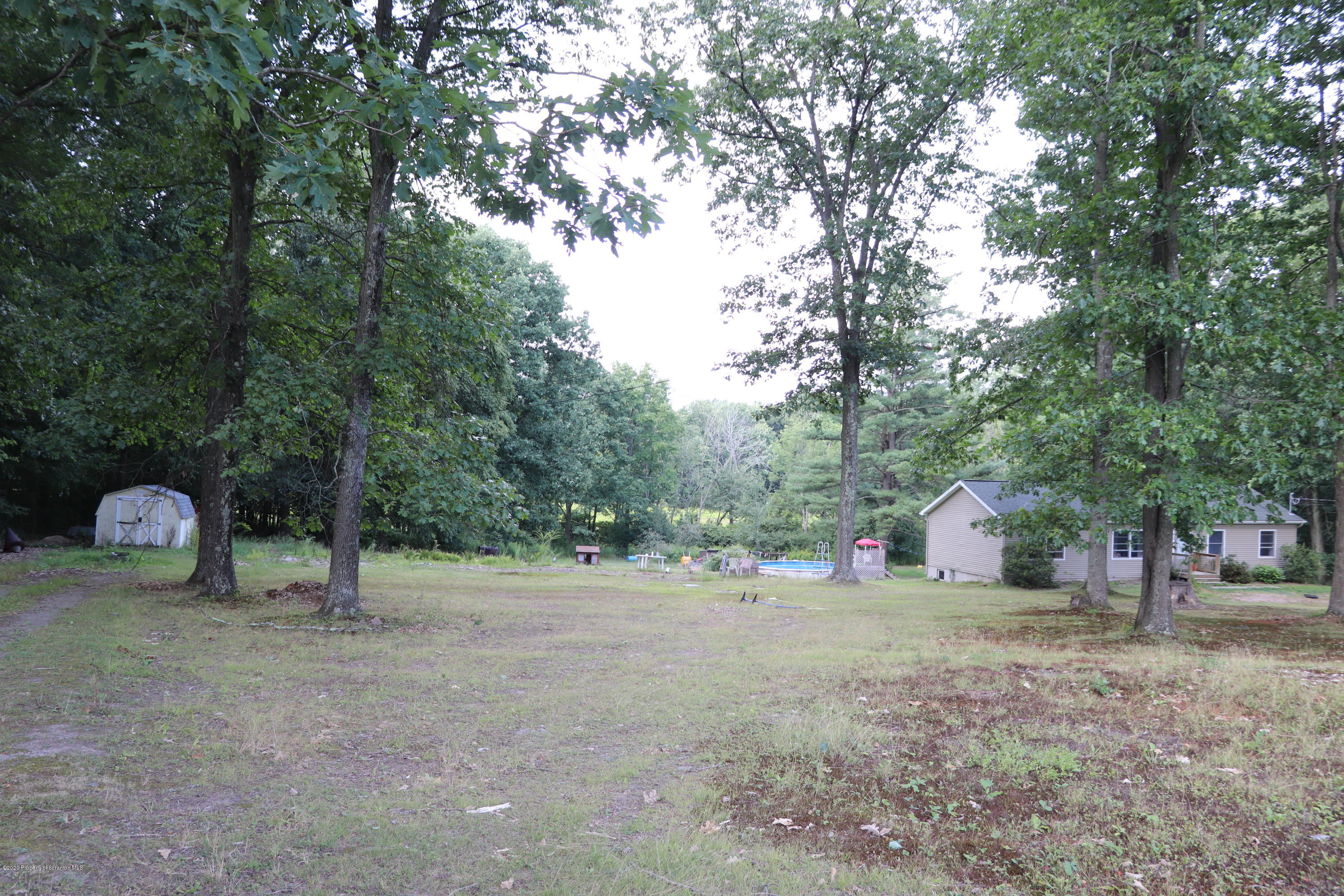 30 Brookside Road Tunkhannock, PA 18657 - Photo 47 of 47 a view of a backyard with large trees