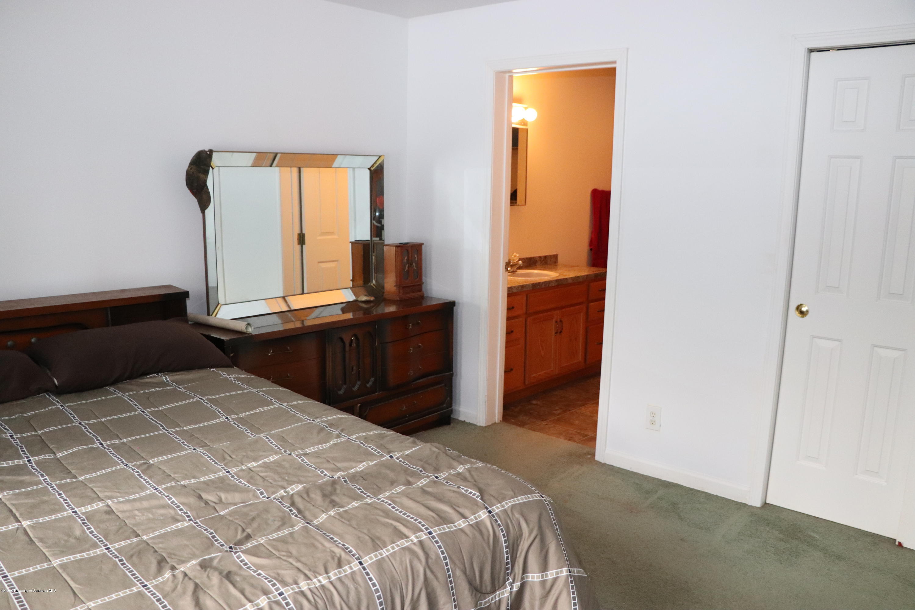 30 Brookside Road Tunkhannock, PA 18657 - Photo 8 of 47 a bedroom with a bed and a dresser