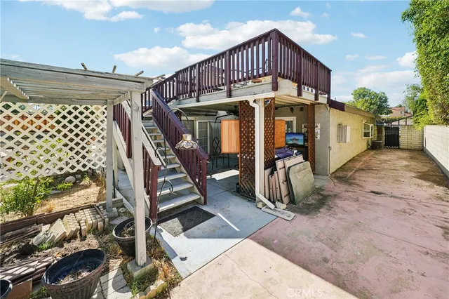 a view of a house with wooden stairs