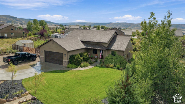 437 Scenic Heights Road Kamas, UT 84036 - Photo 35 of 46 Single-story exterior with a two-car garage and concrete driveway