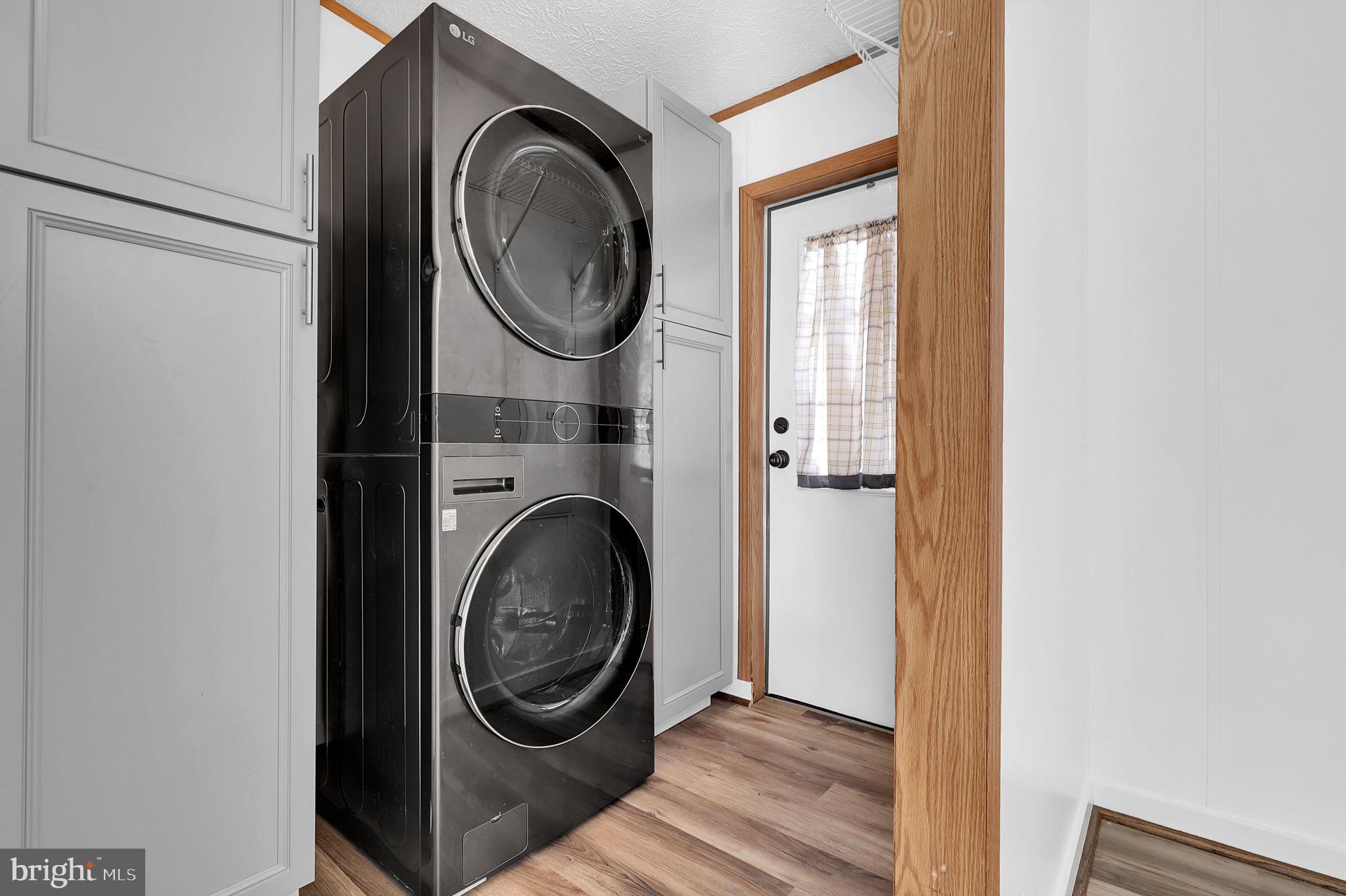 7810 Clark Road, Unit D88 Jessup, MD 20794 - Photo 18 of 30 a view of a storage and utility room with washer and dryer