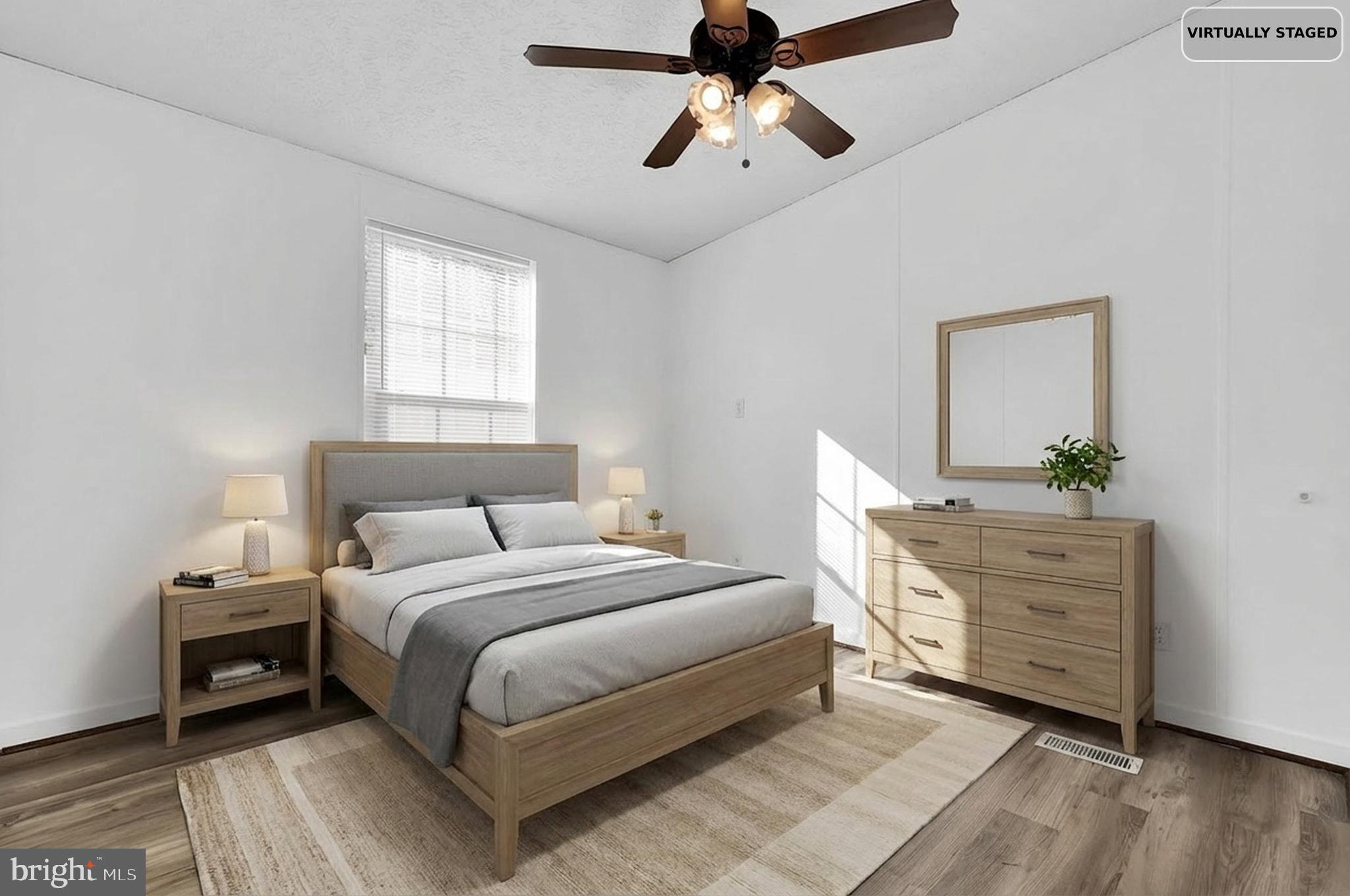 7810 Clark Road, Unit D88 Jessup, MD 20794 - Photo 19 of 30 a bedroom with a bed and a dresser