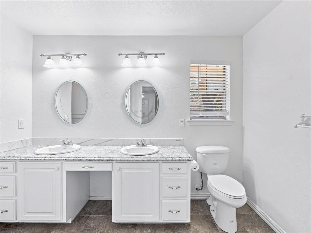3107 South Lipsey Street Decatur, TX 76234 - Photo 29 of 40 Dual sinks with a vanity