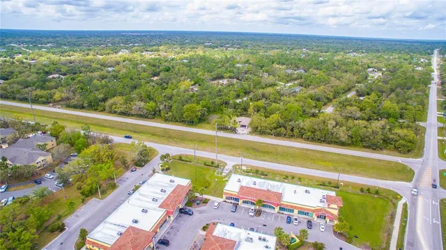 a view of a outdoor space with swimming pool