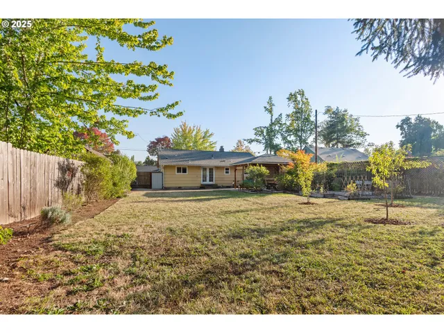 a bathroom with a sink and a yard
