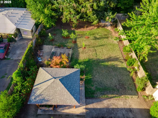 an aerial view of a house having yard
