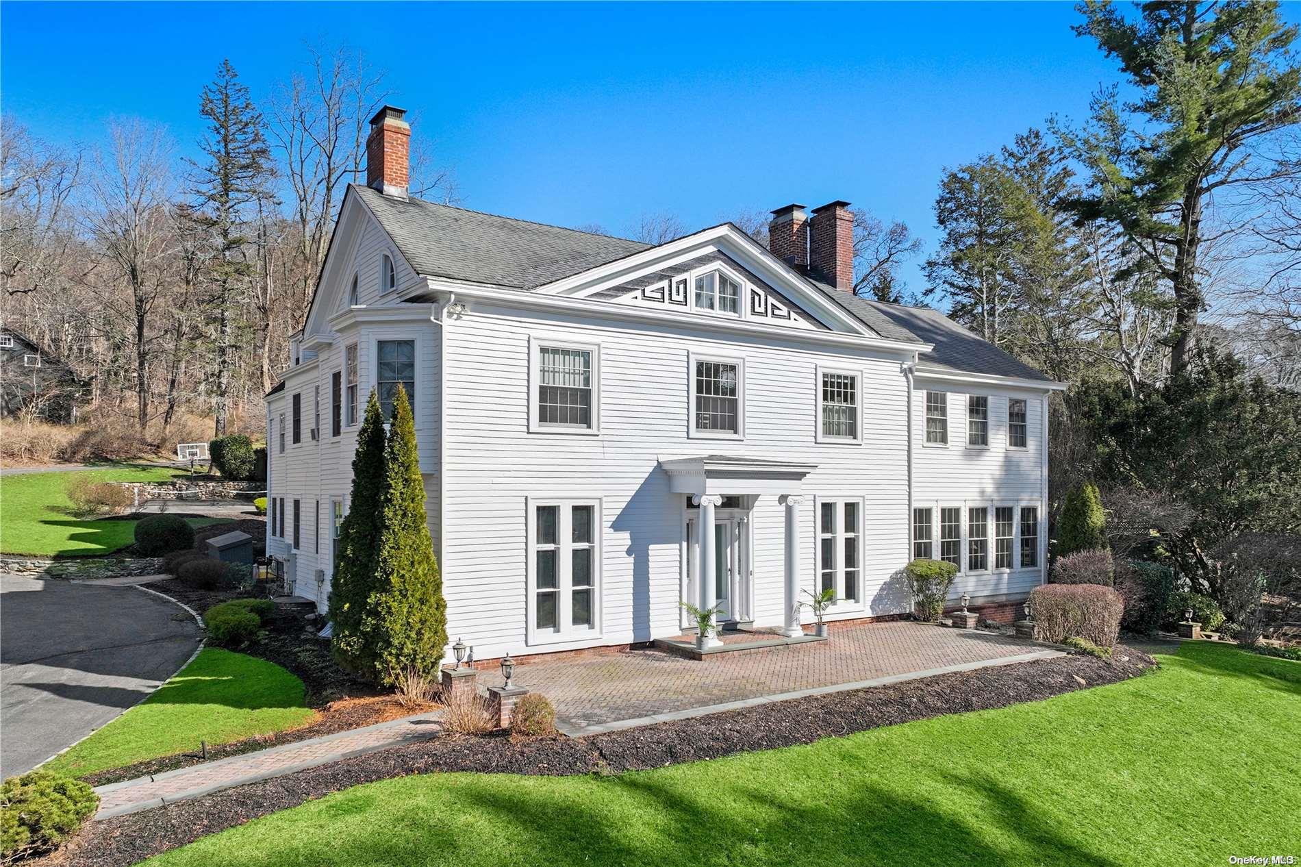 197 Cove Road Oyster Bay, NY 11771 - Photo 1 of 1 a front view of a house with a yard