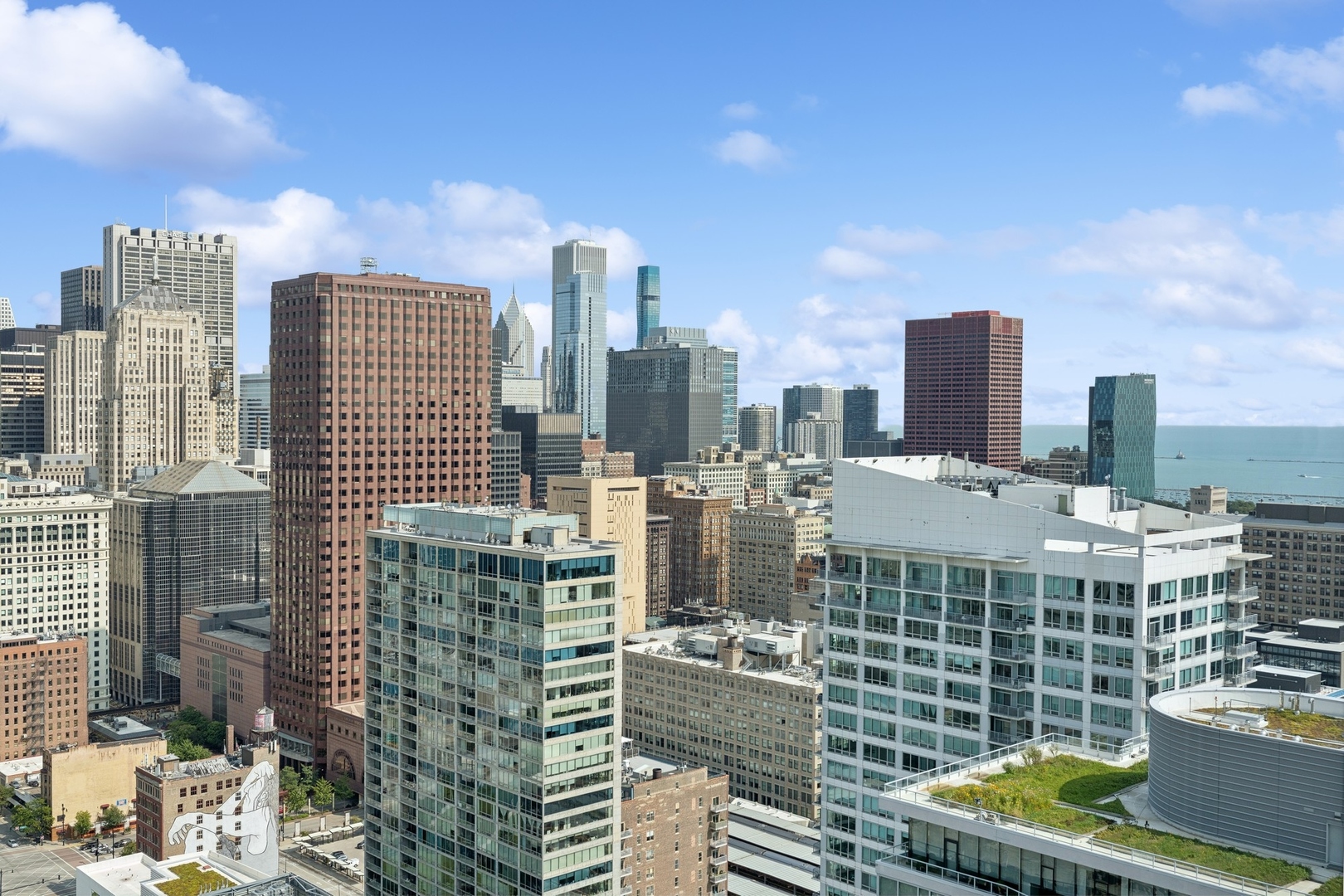 234 West Polk Street, Unit 3704 Chicago, IL 60607 - Photo 30 of 30 a city view with tall buildings