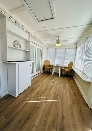 a room with gym equipment and a window