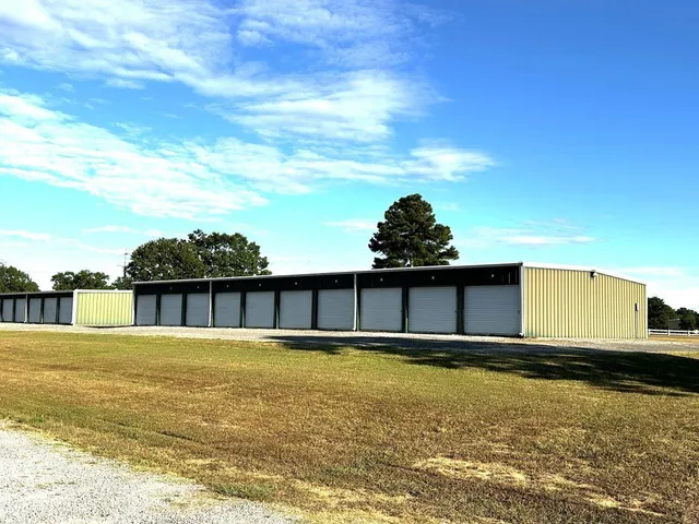 a view of a terrace with yard