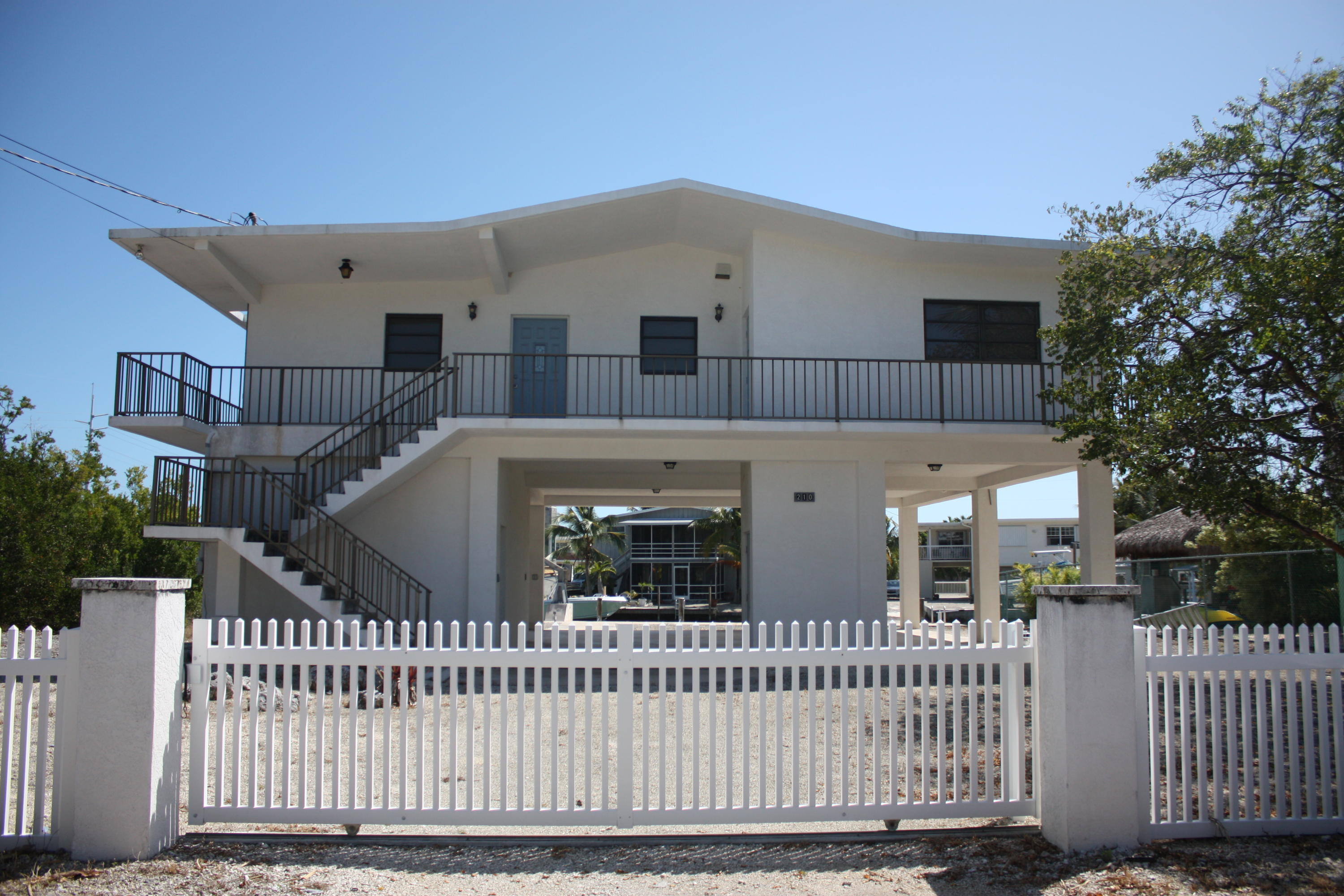 210 Johnny Road Tavernier, FL 33070 - Photo 1 of 35 Exterior from the street