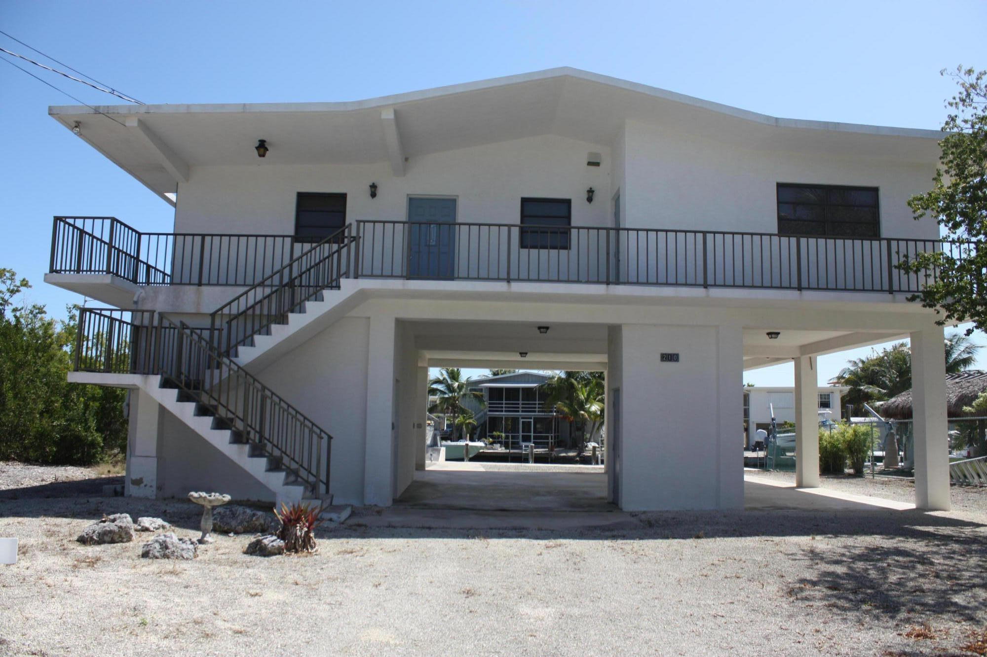 210 Johnny Road Tavernier, FL 33070 - Photo 2 of 35 Exterior from the street