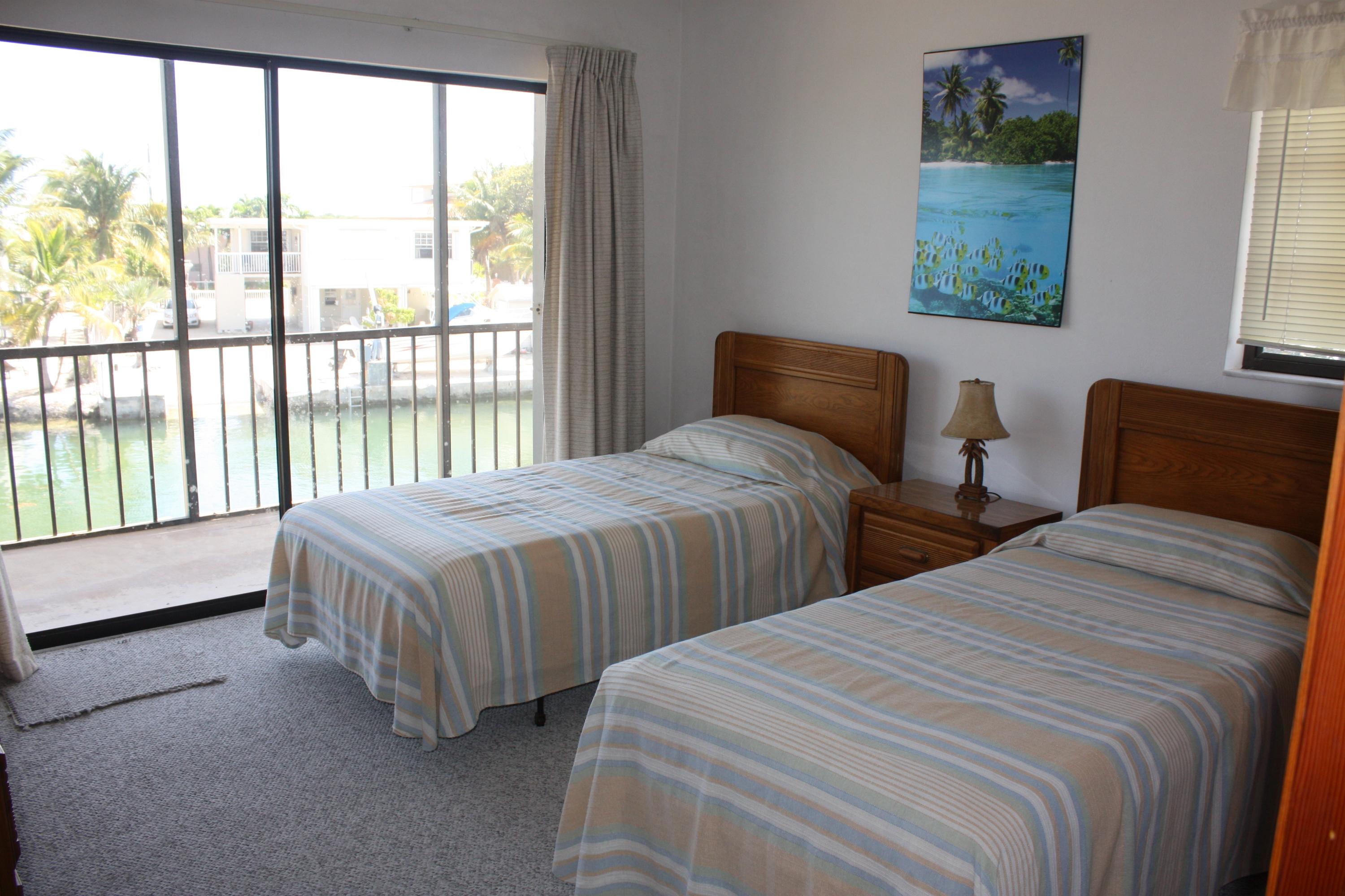 210 Johnny Road Tavernier, FL 33070 - Photo 12 of 35 Second Bedroom