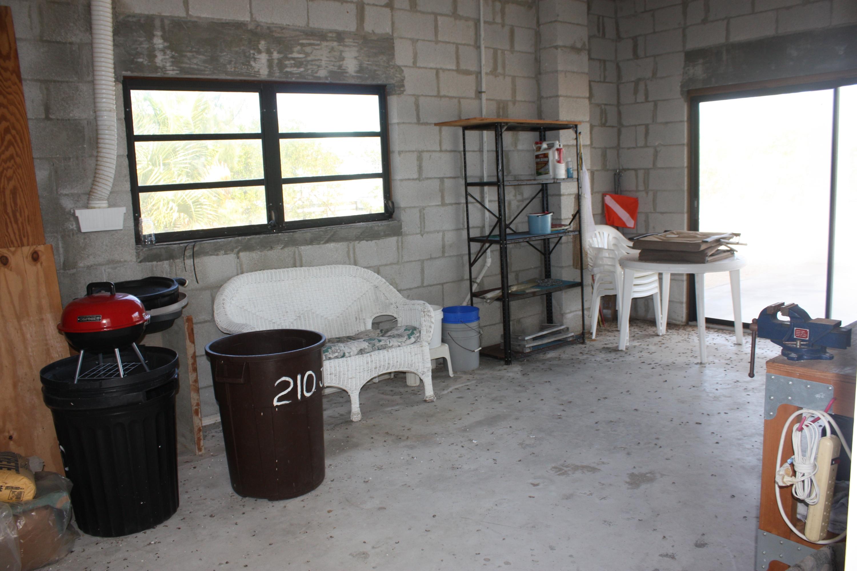 210 Johnny Road Tavernier, FL 33070 - Photo 27 of 35 Downstairs Storage/Workshop