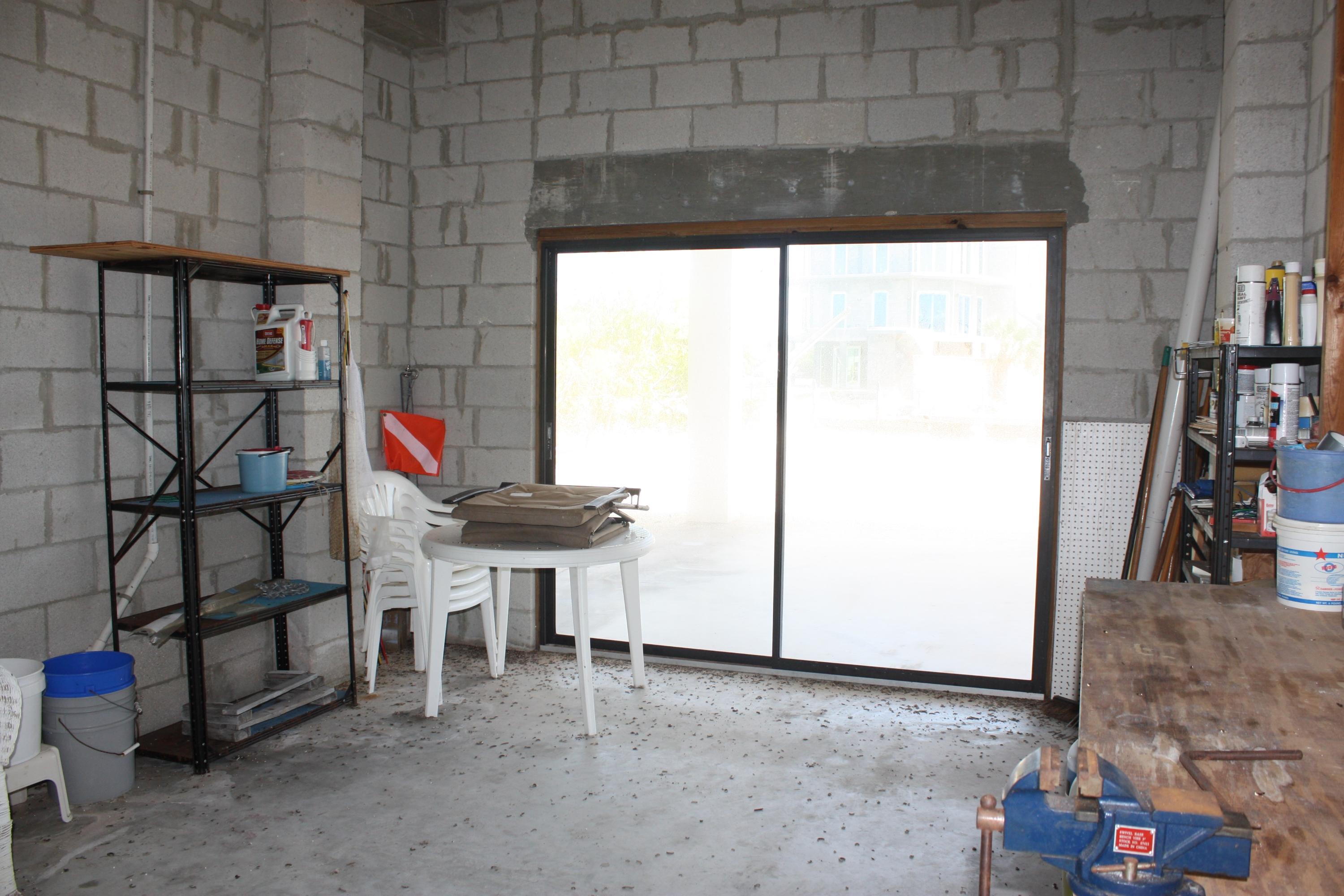 210 Johnny Road Tavernier, FL 33070 - Photo 29 of 35 Downstairs Storage/Workshop