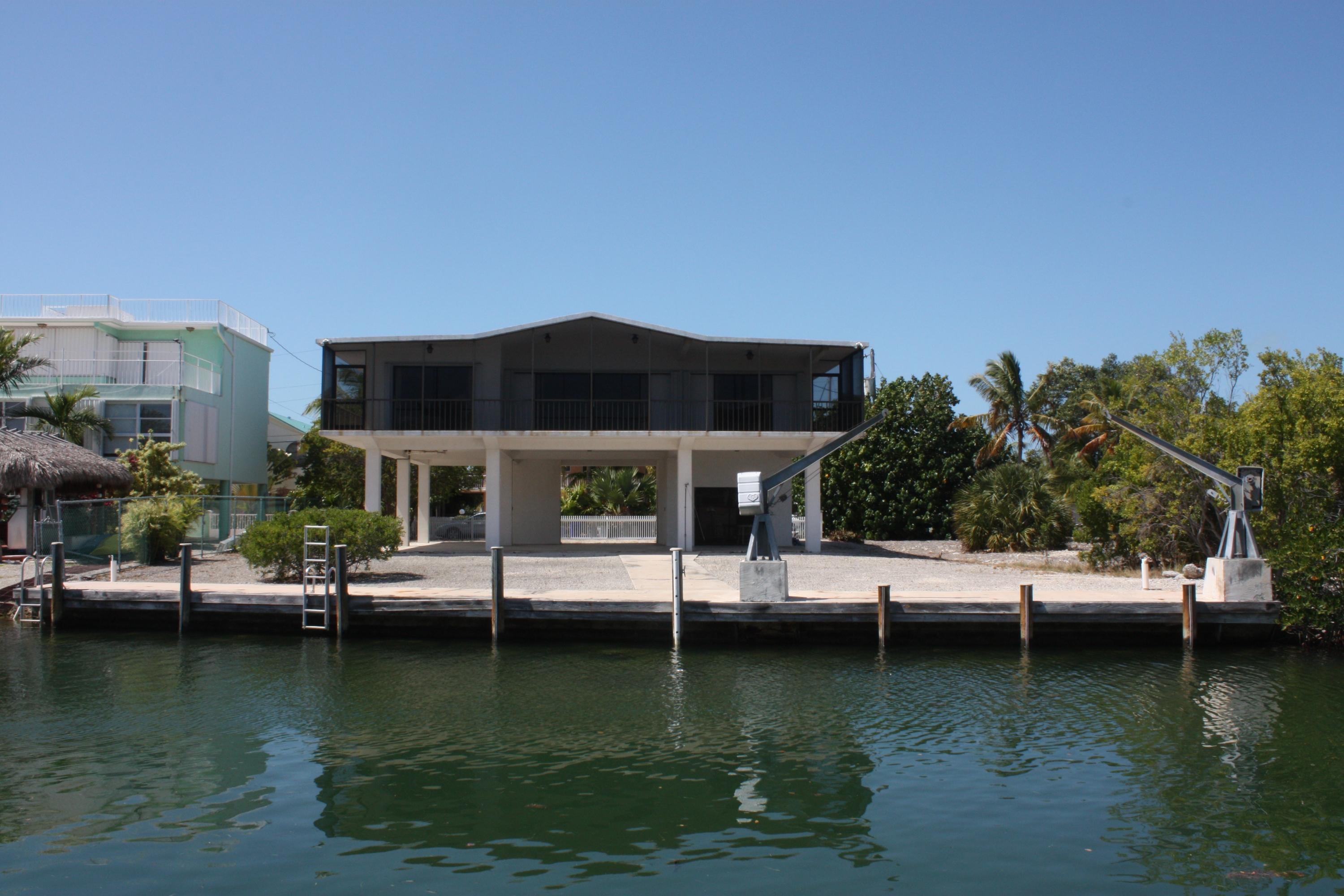 210 Johnny Road Tavernier, FL 33070 - Photo 34 of 35 Exterior from across the canal