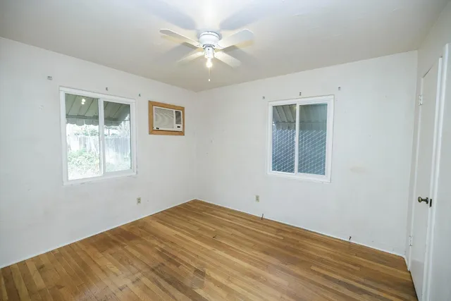 a view of a room with a large window