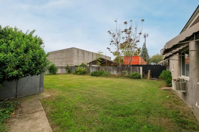 a view of a house with a garden