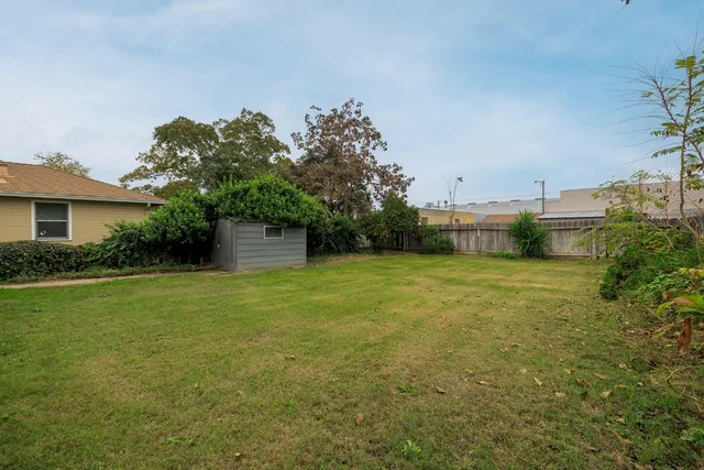 a house view with a garden space