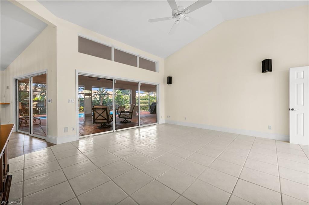 544 Roma Court Naples, FL 34110 - Photo 5 of 41 a view of an empty room with a window