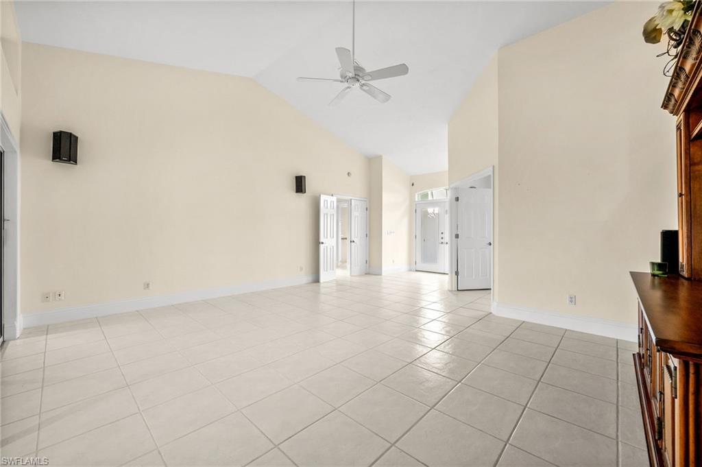 544 Roma Court Naples, FL 34110 - Photo 8 of 41 a view of an empty room and a window