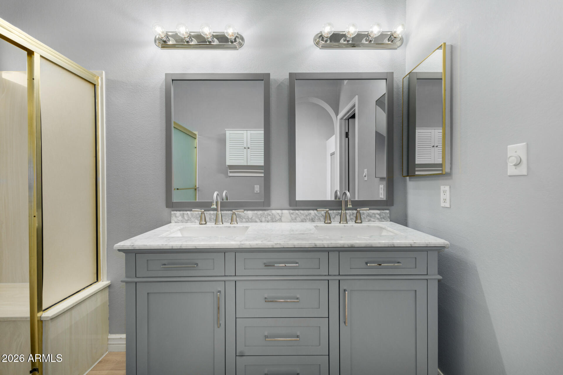 9705 East Mountain View Road, Unit 1126 Scottsdale, AZ 85258 - Photo 13 of 33 a bathroom with double sink and a mirror