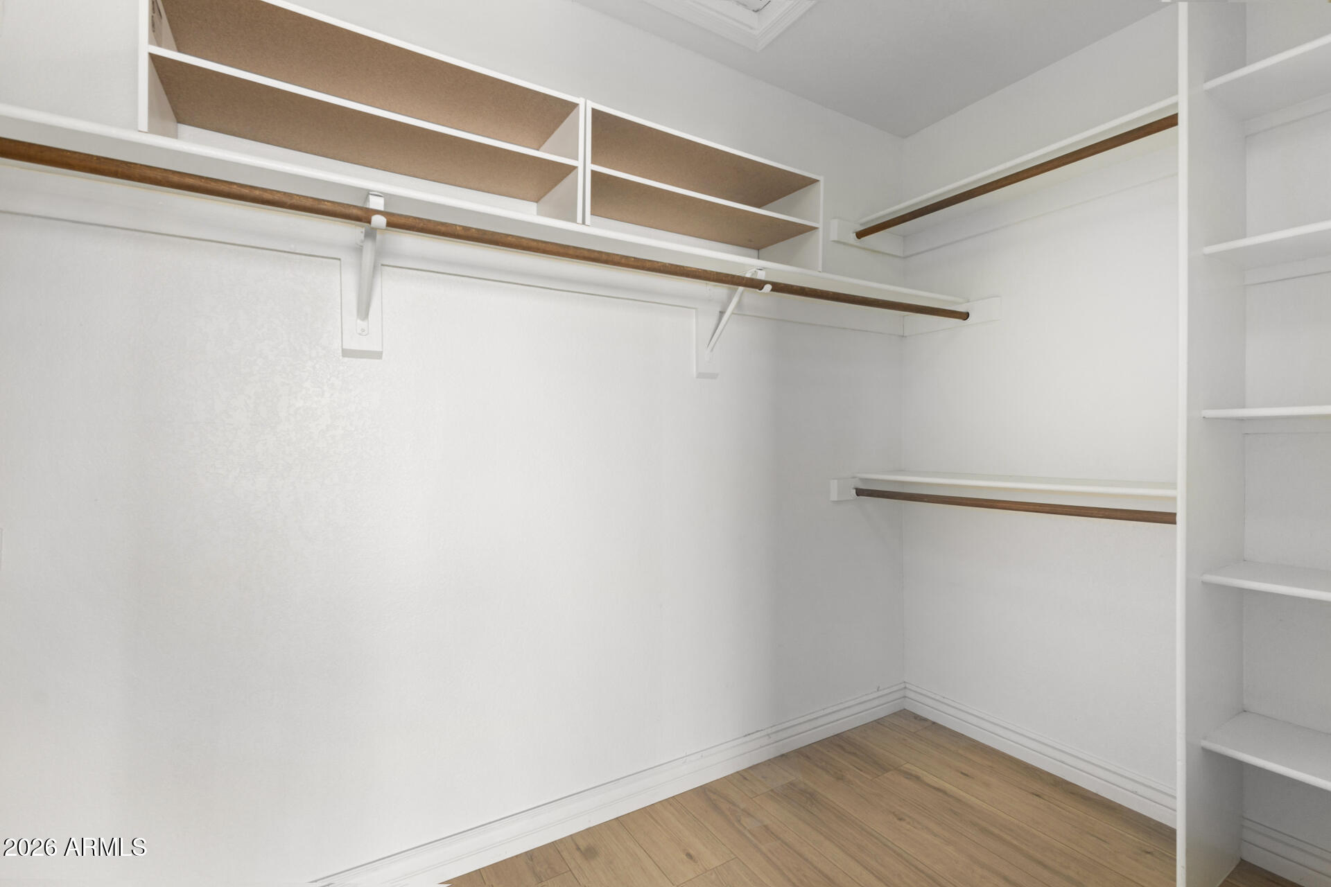 9705 East Mountain View Road, Unit 1126 Scottsdale, AZ 85258 - Photo 14 of 33 a view of a room with racks on the wall