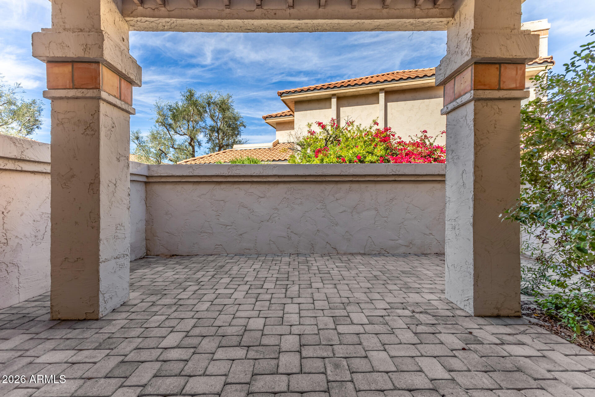 9705 East Mountain View Road, Unit 1126 Scottsdale, AZ 85258 - Photo 17 of 33 a view of a pathway both side of house