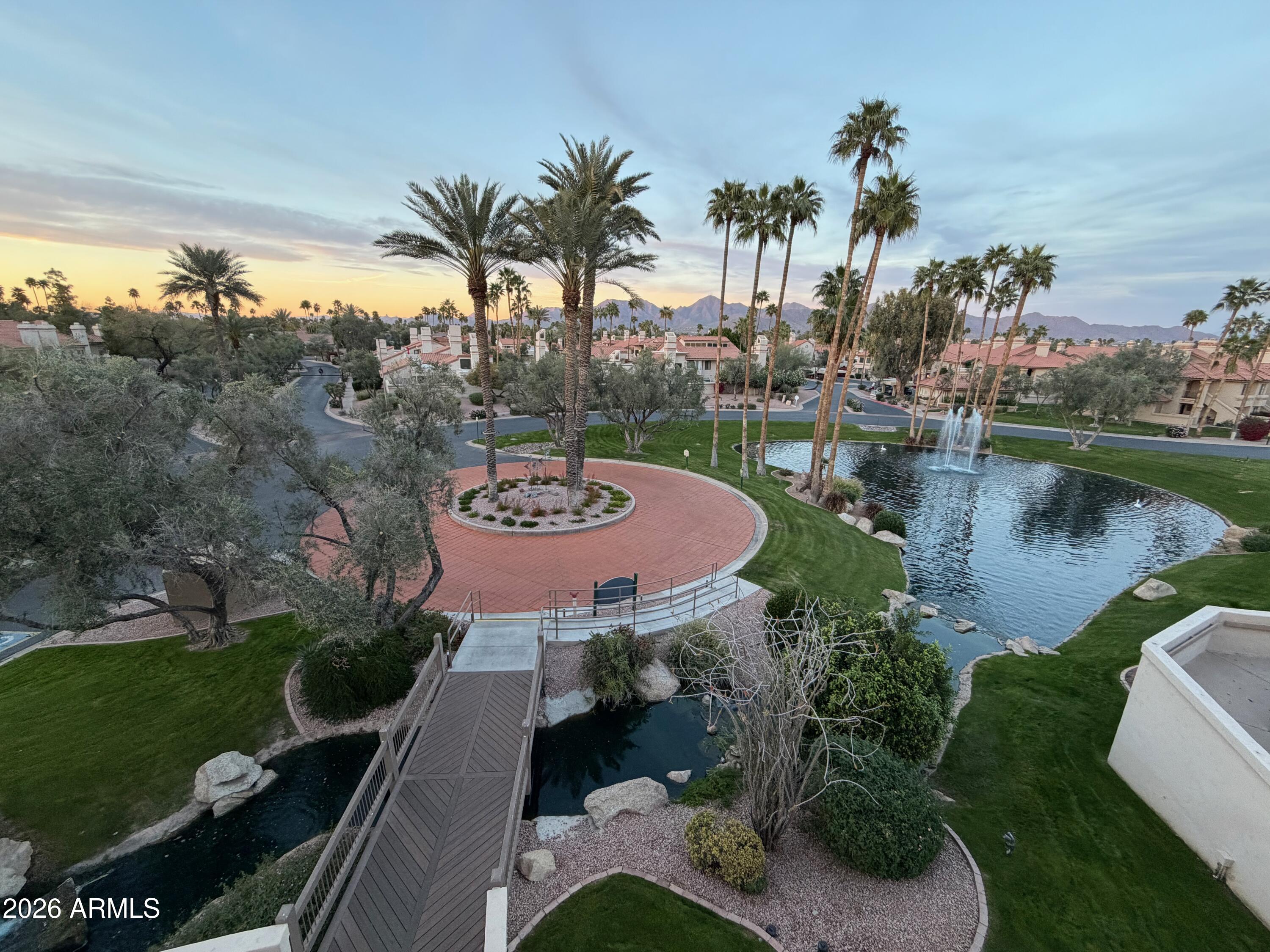 9705 East Mountain View Road, Unit 1126 Scottsdale, AZ 85258 - Photo 20 of 33 a view of a swimming pool with a patio