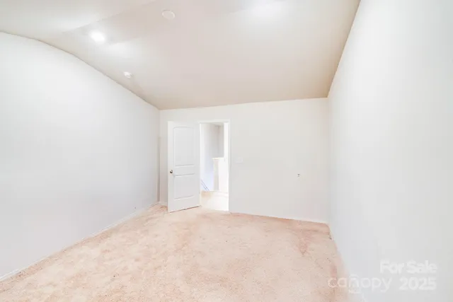 a view of a room that has a window in it