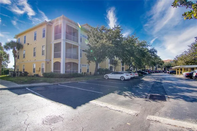 a view of a building with a yard