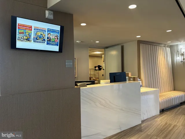 a view of a lobby with gym equipment