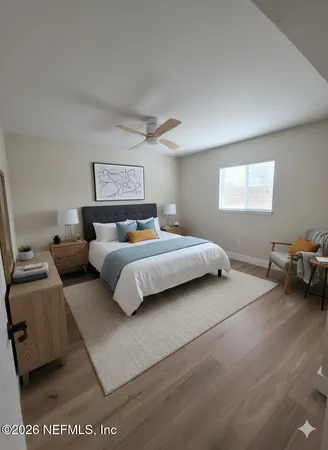 a bedroom with a bed and a couch