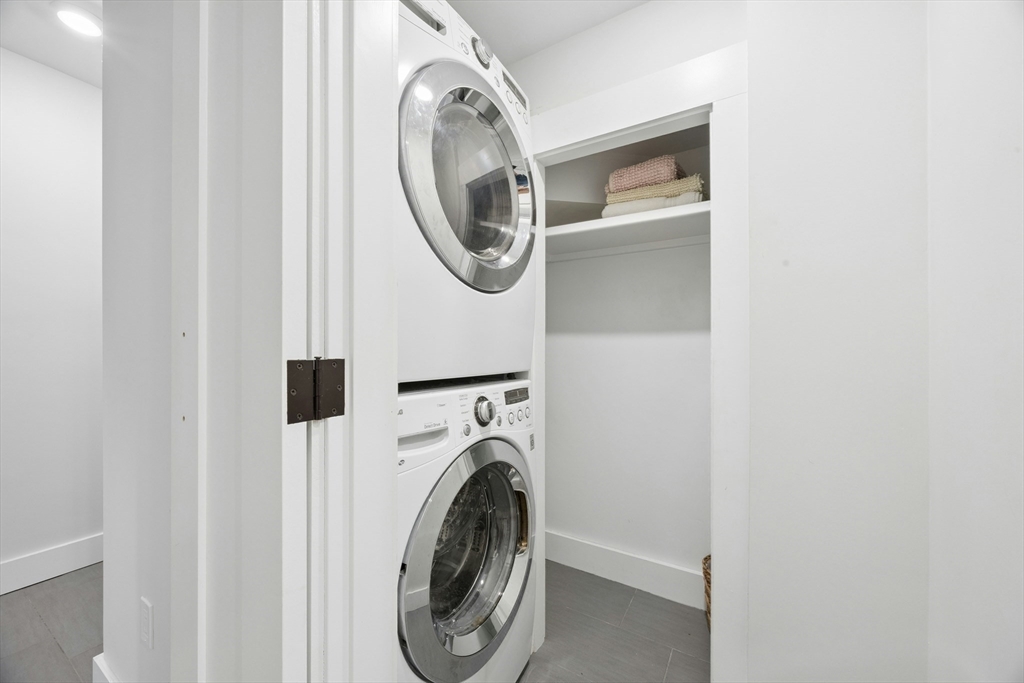 90 Florian Street Boston, MA 02130 - Photo 29 of 32 a utility room with dryer and washer