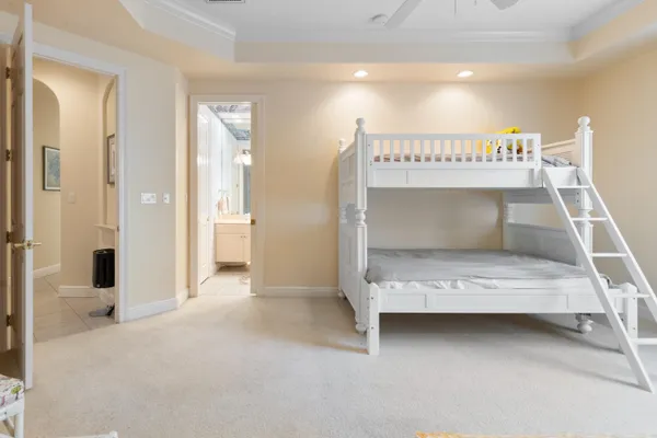 a bedroom with bed and window