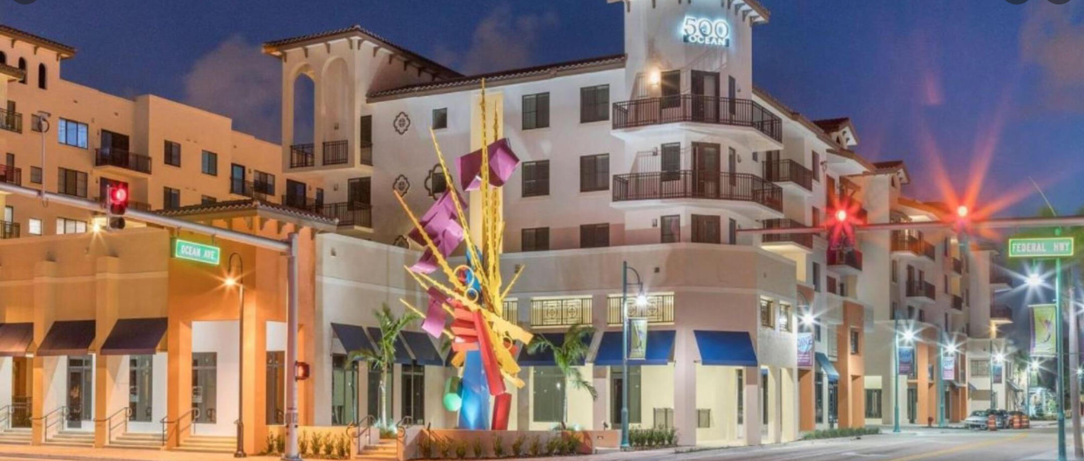 316 Southeast 1st Street, Unit 4 Boynton Beach, FL 33435 - Photo 15 of 16 a front view of a building with a lot of windows