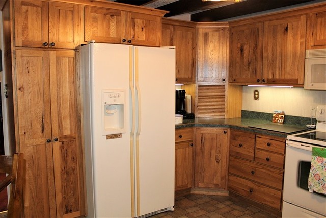 20299 Pigeon Road Morrison, IL 61270 - Photo 8 of 58 a kitchen with a refrigerator and cabinets