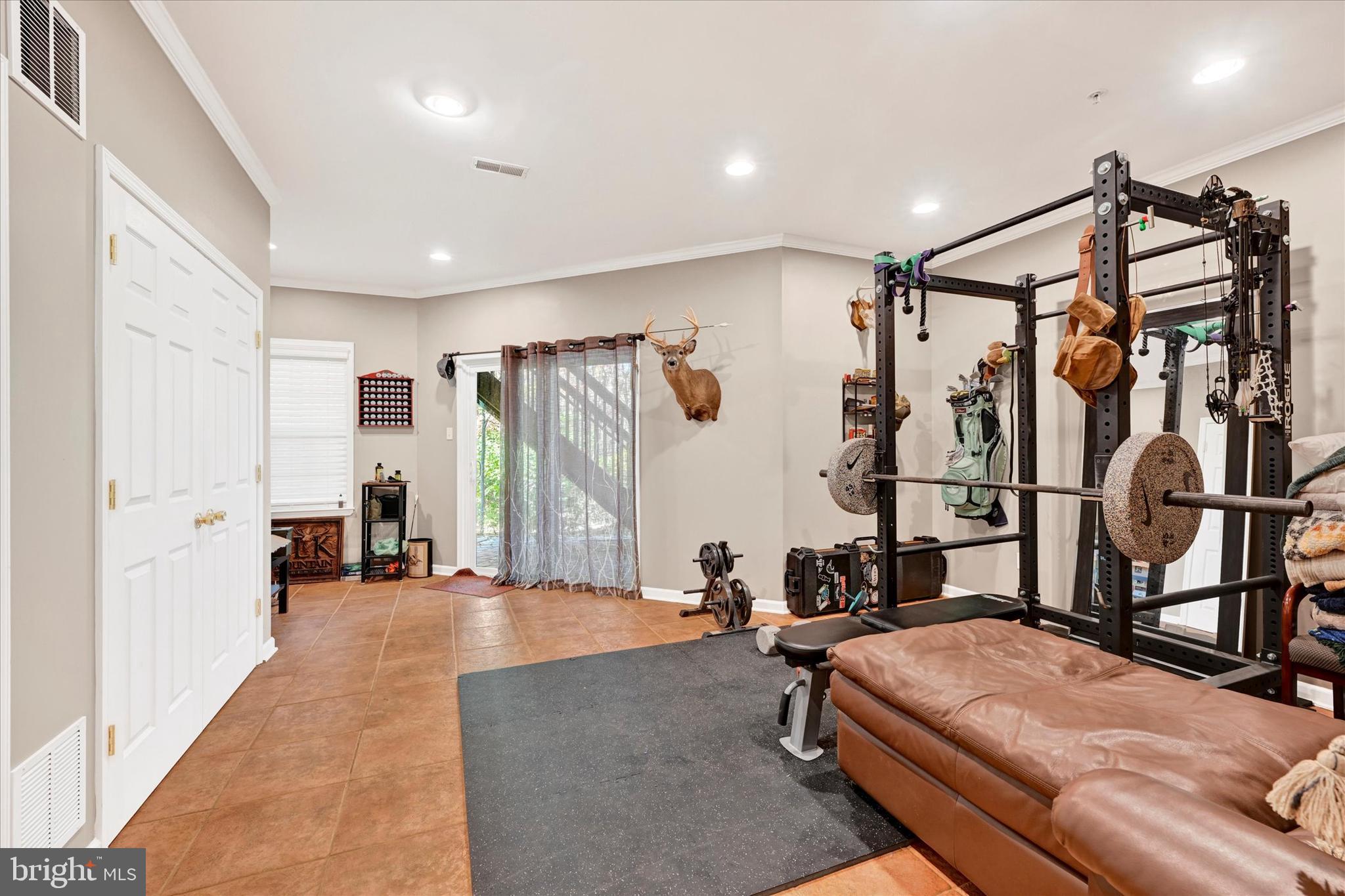 2370 Sandy Walk Way Odenton, MD 21113 - Photo 11 of 33 a bedroom with furniture and a window