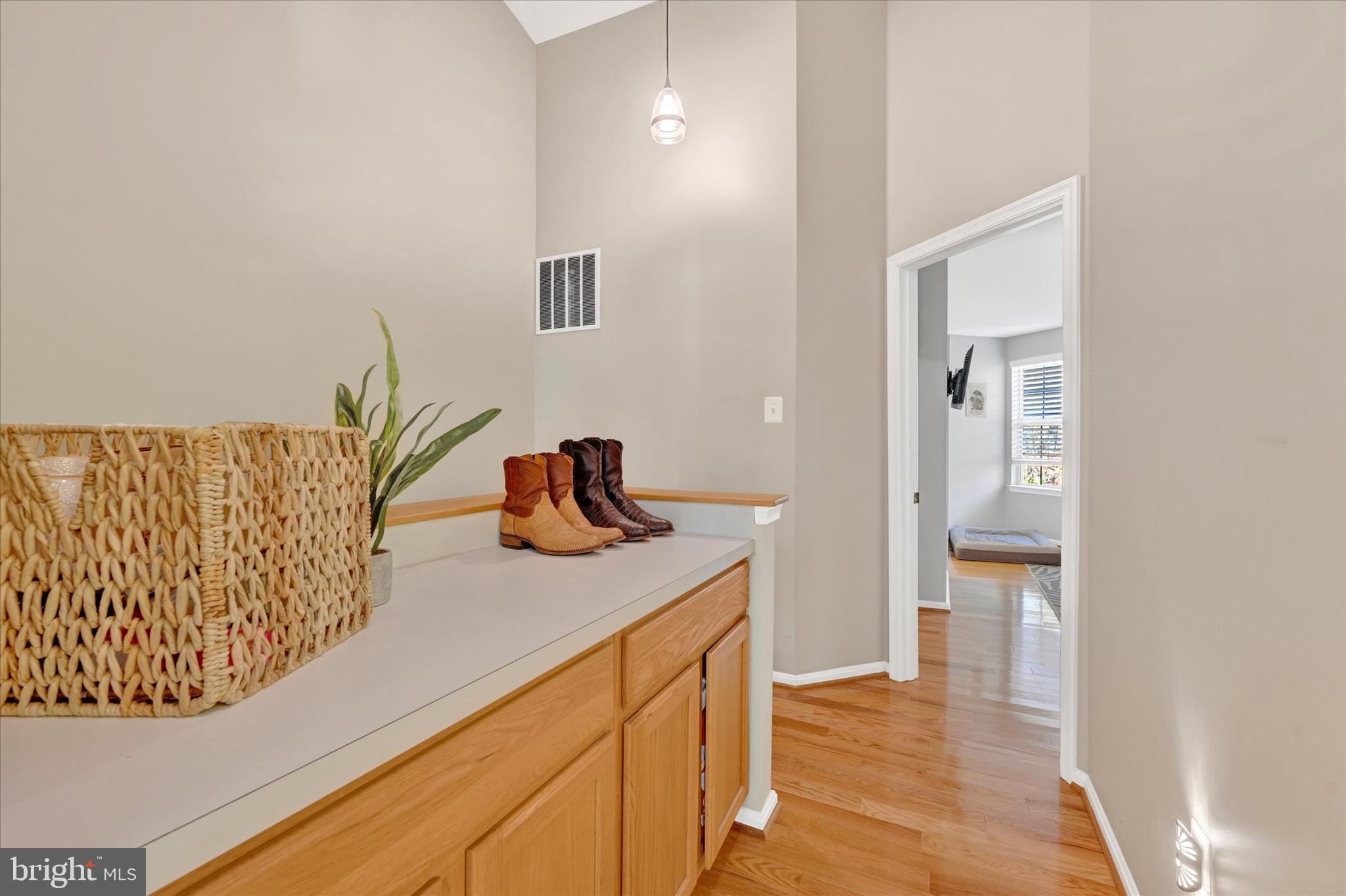 2370 Sandy Walk Way Odenton, MD 21113 - Photo 22 of 33 a bathroom with a sink and a mirror