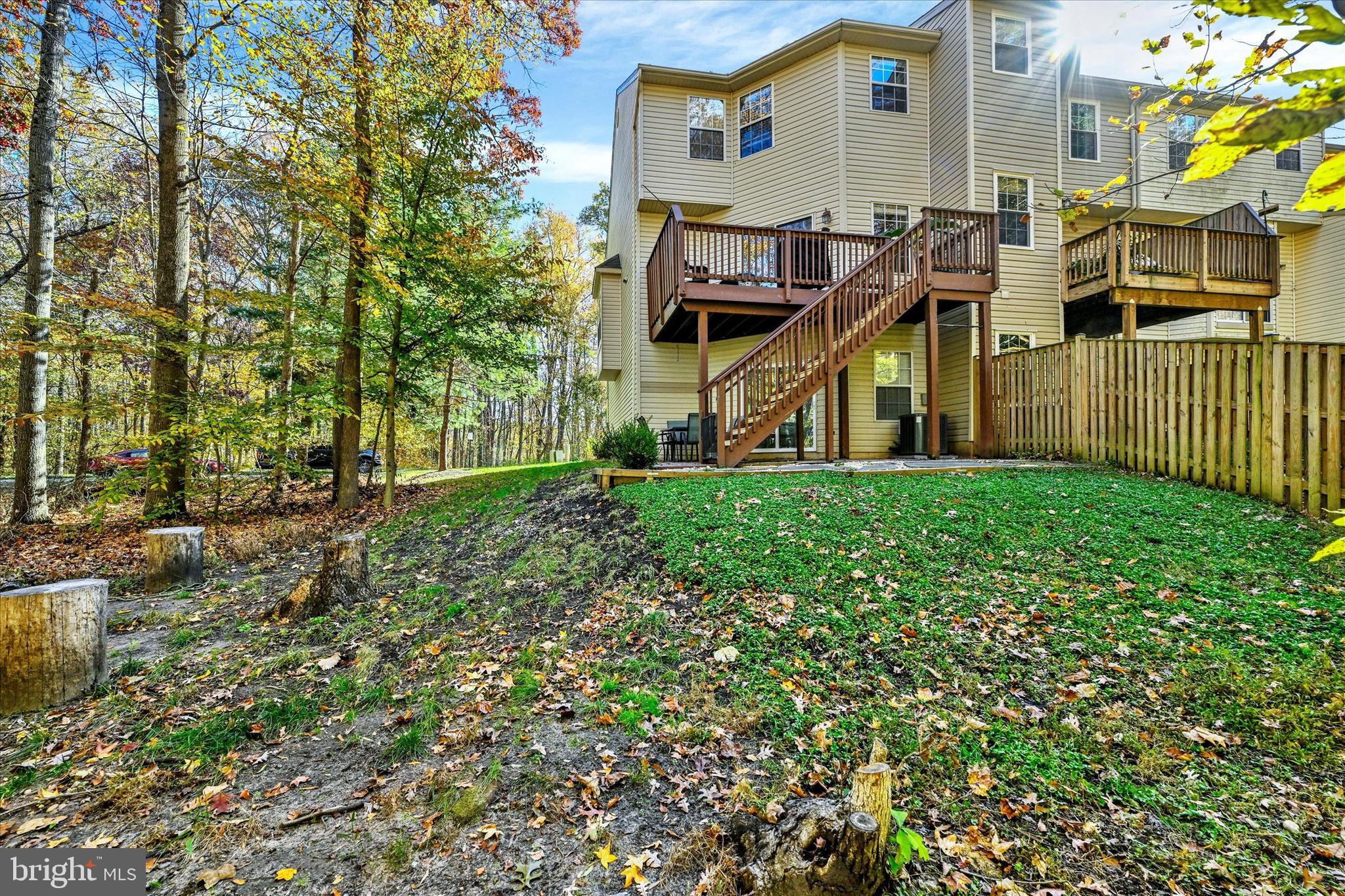2370 Sandy Walk Way Odenton, MD 21113 - Photo 5 of 33 a view of a house with a yard