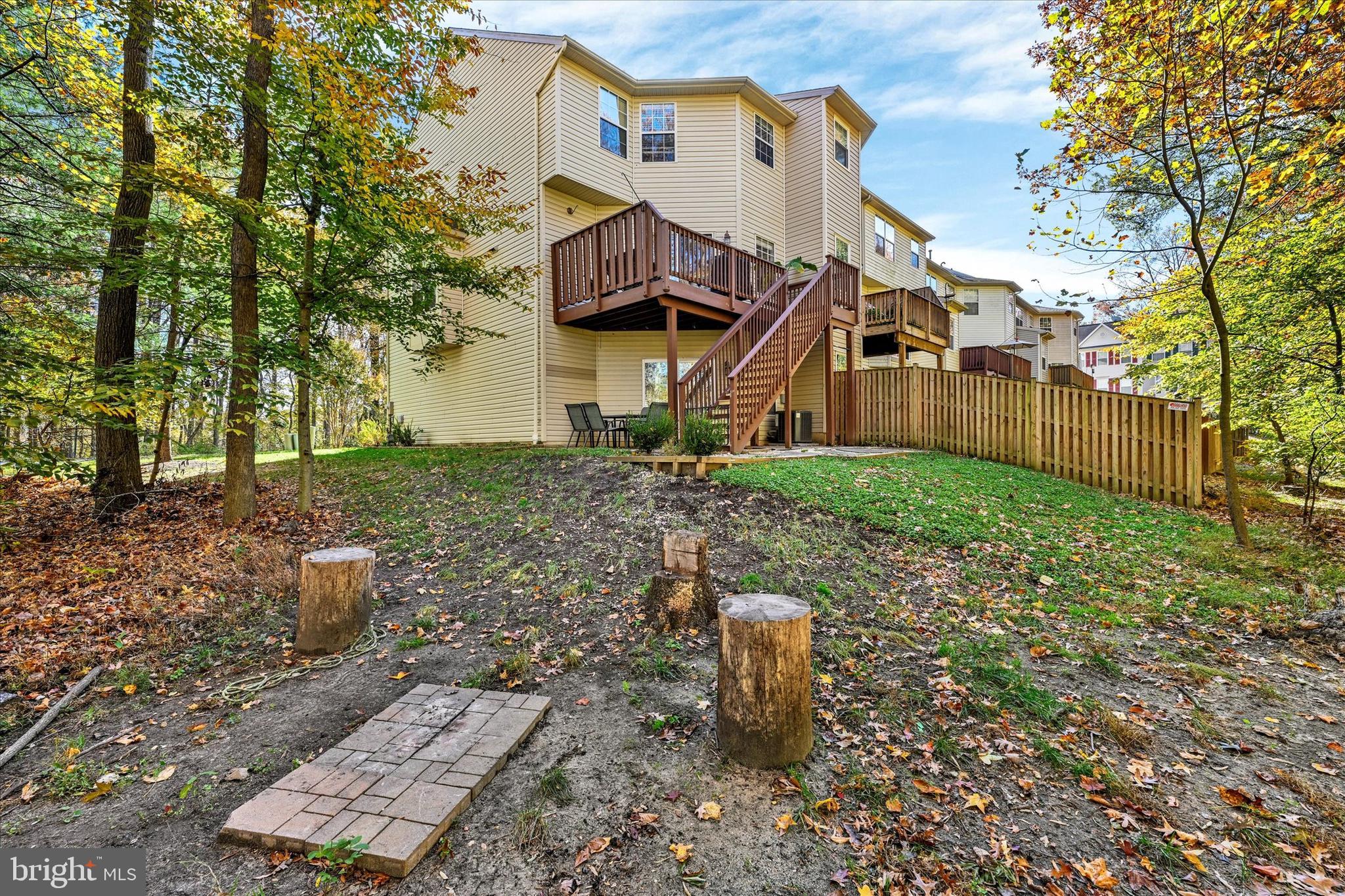 2370 Sandy Walk Way Odenton, MD 21113 - Photo 6 of 33 a view of a small house with a yard